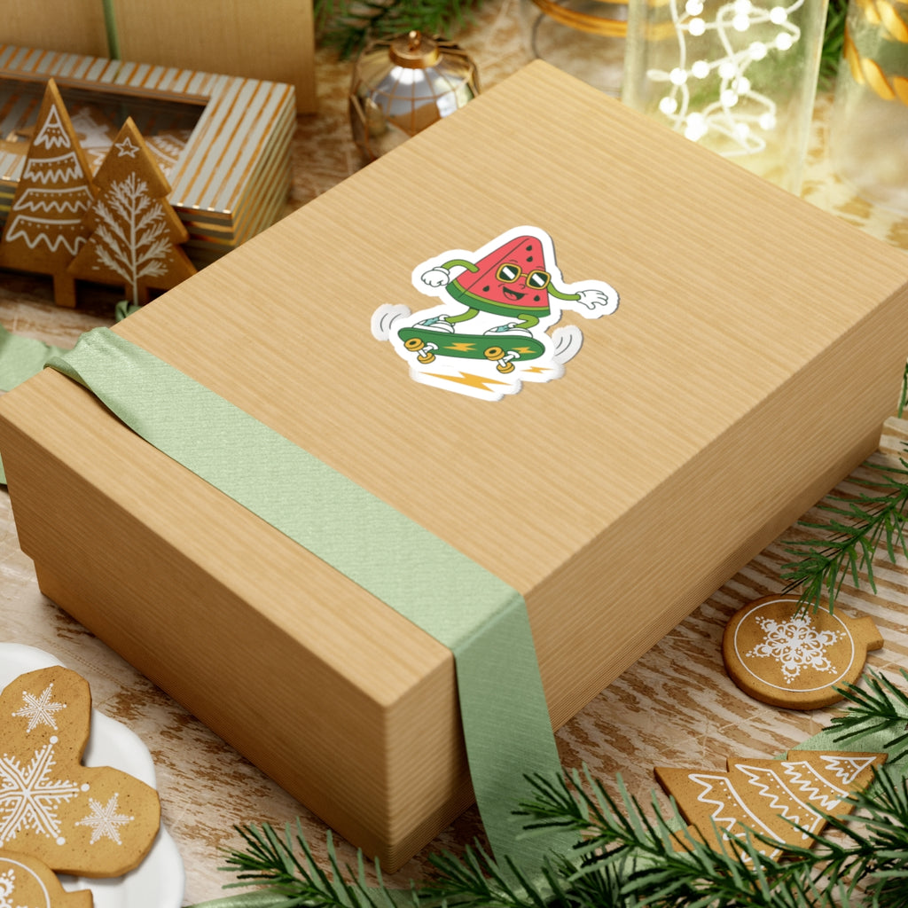 Gift box with a watermelon man surfing on a festive background with cookies and decorations
