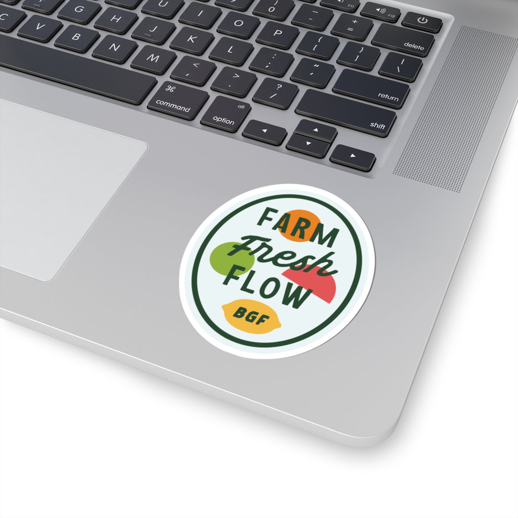 Laptop with a 'Farm Fresh Flow' sticker on the palm rest area